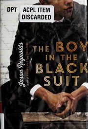 Front cover of The boy in the black suit by Jason Reynolds