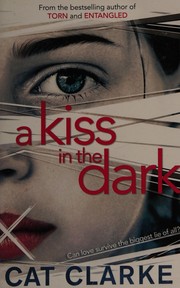 Front cover of A kiss in the dark by Cat Clarke