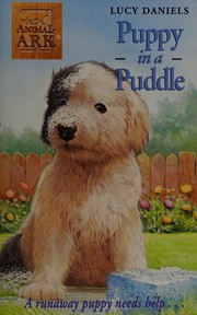 Cover of Puppy in a puddle by Lucy Daniels