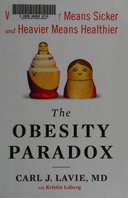 Front cover of The obesity paradox by Carl J. Lavie