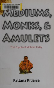 Cover of Mediums, monks, and amulets by Phatthanā Kitiʻāsā
