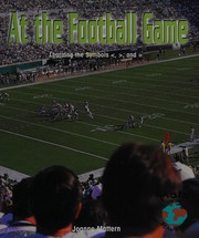 Front cover of At the football game by Joanne Mattern