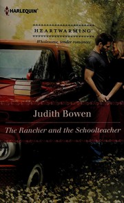 Front cover of The rancher and the schoolteacher by Judith Bowen