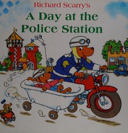 Front cover of Richard Scarry's A day at the police station by Richard Scarry