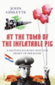 Front cover of At the tomb of the inflatable pig by John Gimlette