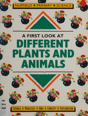 Front cover of A first look at different plants and animals by Pamela Wadsworth