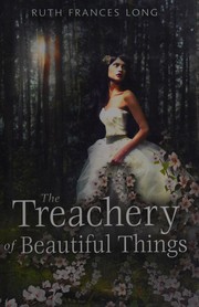 Front cover of The treachery of beautiful things by Ruth Frances Long