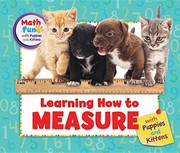Cover of Learning How to Measure with Puppies and Kittens by Eustacia Moldovo