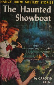 Front cover of The haunted showboat by Carolyn Keene