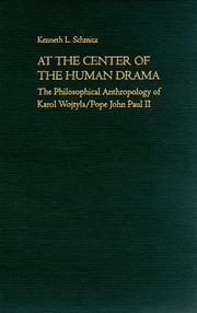 Cover of At the center of the human drama by Kenneth L. Schmitz