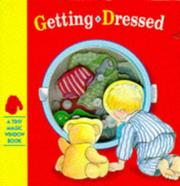 Cover of Getting Dressed (Tiny Magic Window Books) by Stewart Cowley