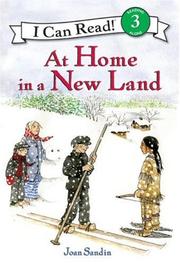 Cover of At Home in a New Land by Joan Sandin