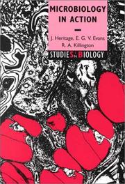 Front cover of Microbiology in action by J. Heritage