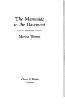 Front cover of The mermaids in the basement by Marina Warner