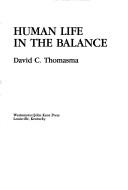 Front cover of Human life in the balance by David C. Thomasma