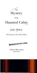 Front cover of The mystery of the haunted cabin by Judy Delton