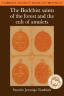 Front cover of The Buddhist saints of the forest and the cult of amulets by S. J. Tambiah