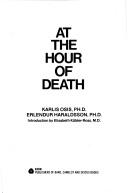 Front cover of At the hour of death by Karlis Osis