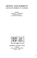 Front cover of Money and markets by Robert W. Clower
