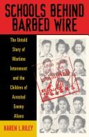Front cover of Schools behind Barbed Wire by Karen L. Riley