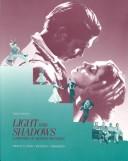 Cover of Light and shadows by Thomas W. Bohn