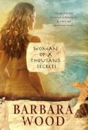 Front cover of Woman of a thousand secrets by Barbara Wood