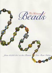 Front cover of The history of beads by Lois Sherr Dubin