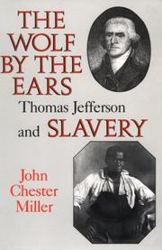 Front cover of The wolf by the ears by John Chester Miller