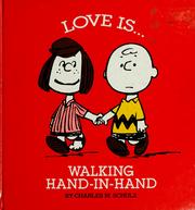 Front cover of Love Is Walking Hand in Hand by Charles M. Schulz
