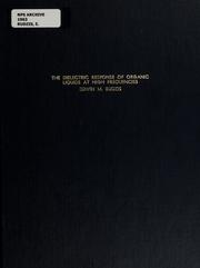 Front cover of The dielectric response of organic liquids at high frequencies by Edwin M. Rudzis