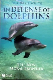 Front cover of In Defense of Dolphins by Thomas I. White