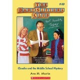 Front cover of Claudia and the middle school mystery. (Baby-Sitters Club no.040) by Ann M. Martin