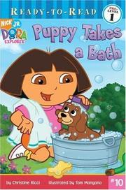 Front cover of Puppy takes a bath by Christine Ricci