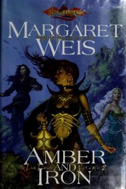 Front cover of Amber and Iron by Margaret Weis