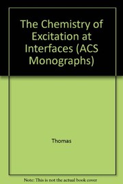 Front cover of The chemistry of excitation at interfaces by J. Kerry Thomas
