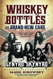Front cover of Whiskey bottles and brand-new cars by Mark Ribowsky
