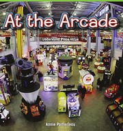 Front cover of At the Arcade by Annie Pomerleau