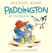 Front cover of Paddington at the Beach by Michael Bond