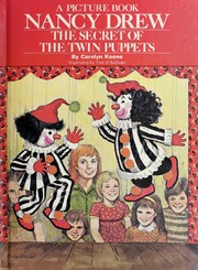 Front cover of The secret of the twin puppets by Carolyn Keene