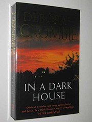 Front cover of In a Dark House by Deborah Crombie